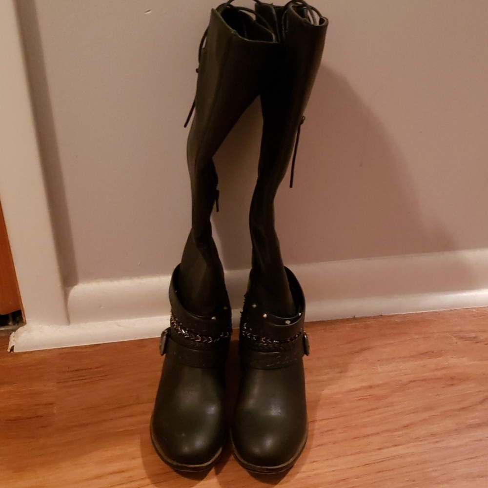 Tall black embellished boots